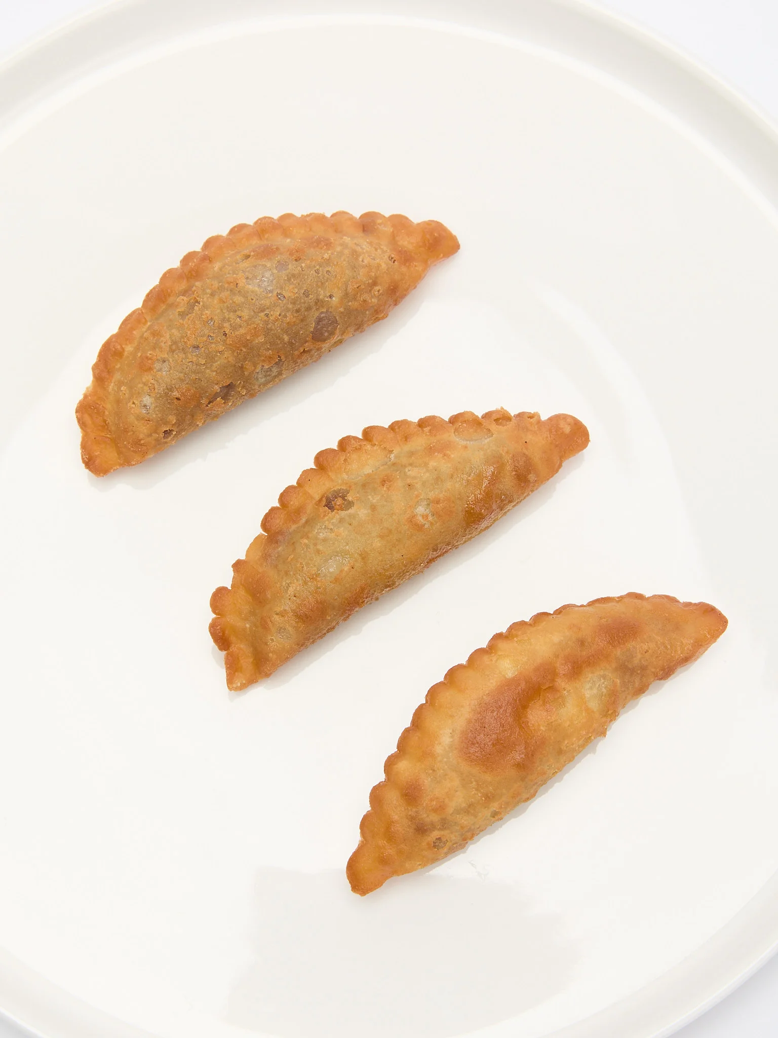 Чебуреки с яблоком обжаренные/готовые